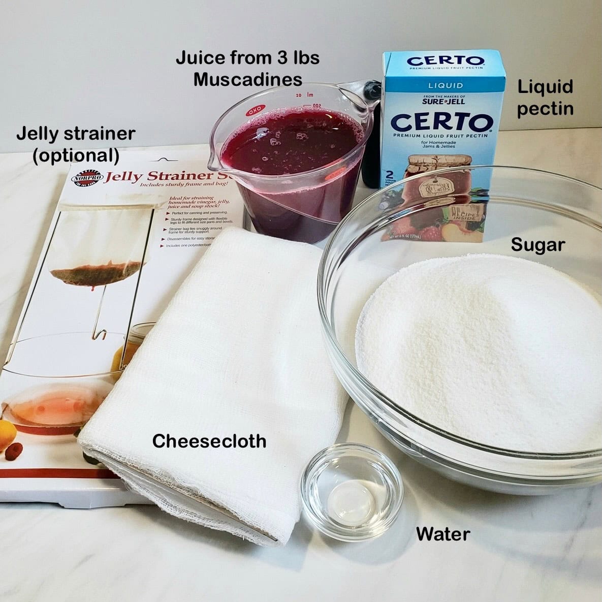Ingredients needed to make muscadine jelly.