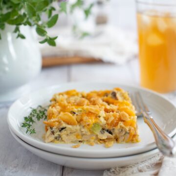 Side view of a portion of chicken wild rice casserole served on a plate.