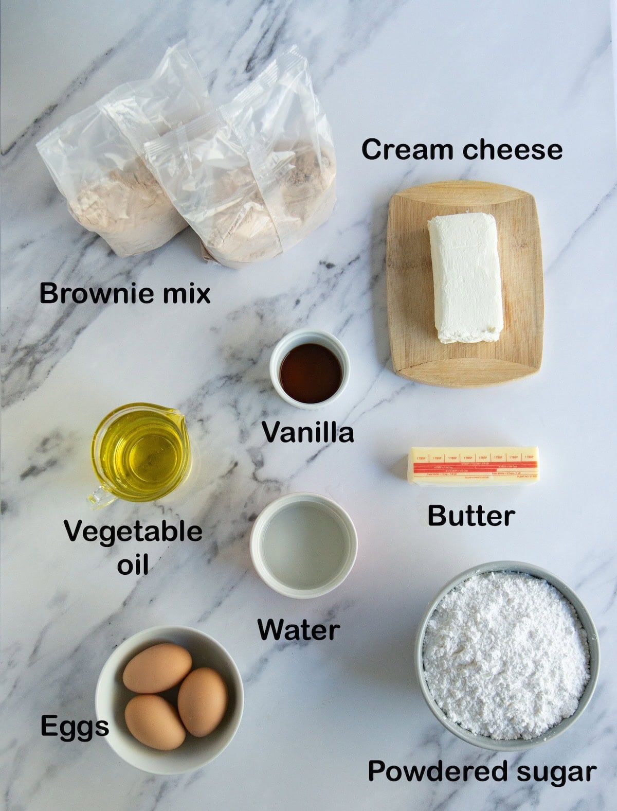 Ingredients needed to make brownies with cream cheese frosting.