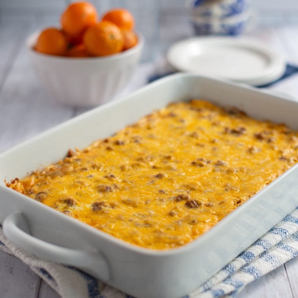 Sausage and hashbrown breakfast casserole in a baking dish after baking.