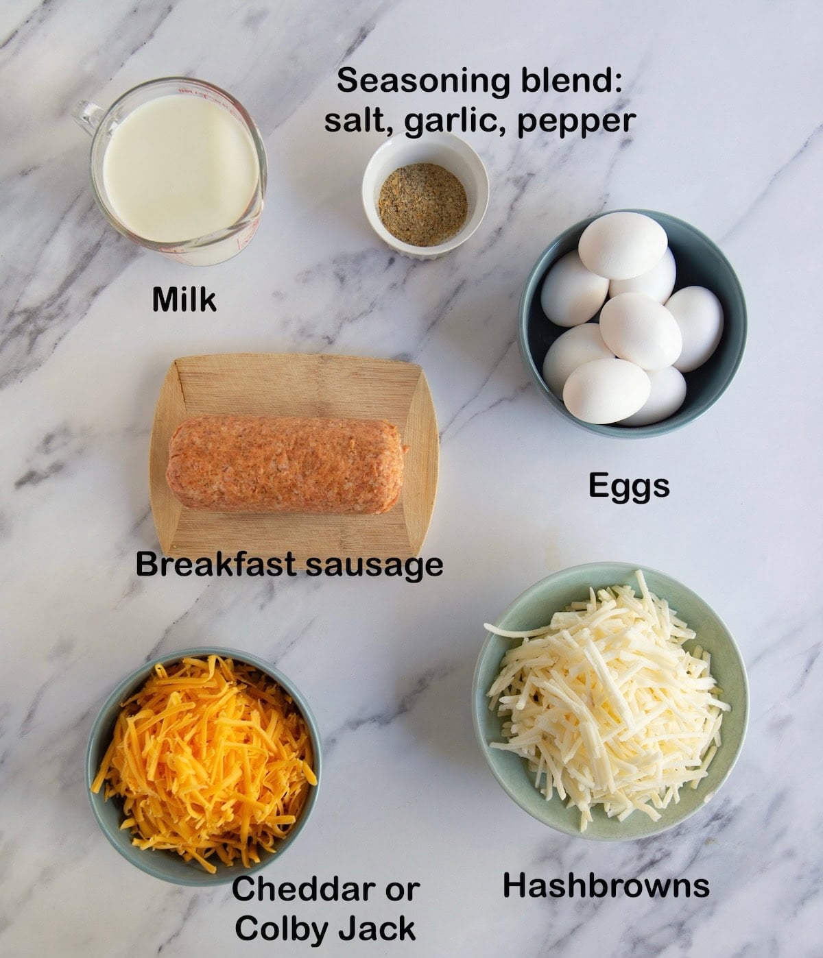 Ingredients needed to make sausage and hashbrown breakfast casserole.